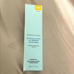SkinCeuticals Matte UV Defense SPF 50 - Light Blue and Yellow